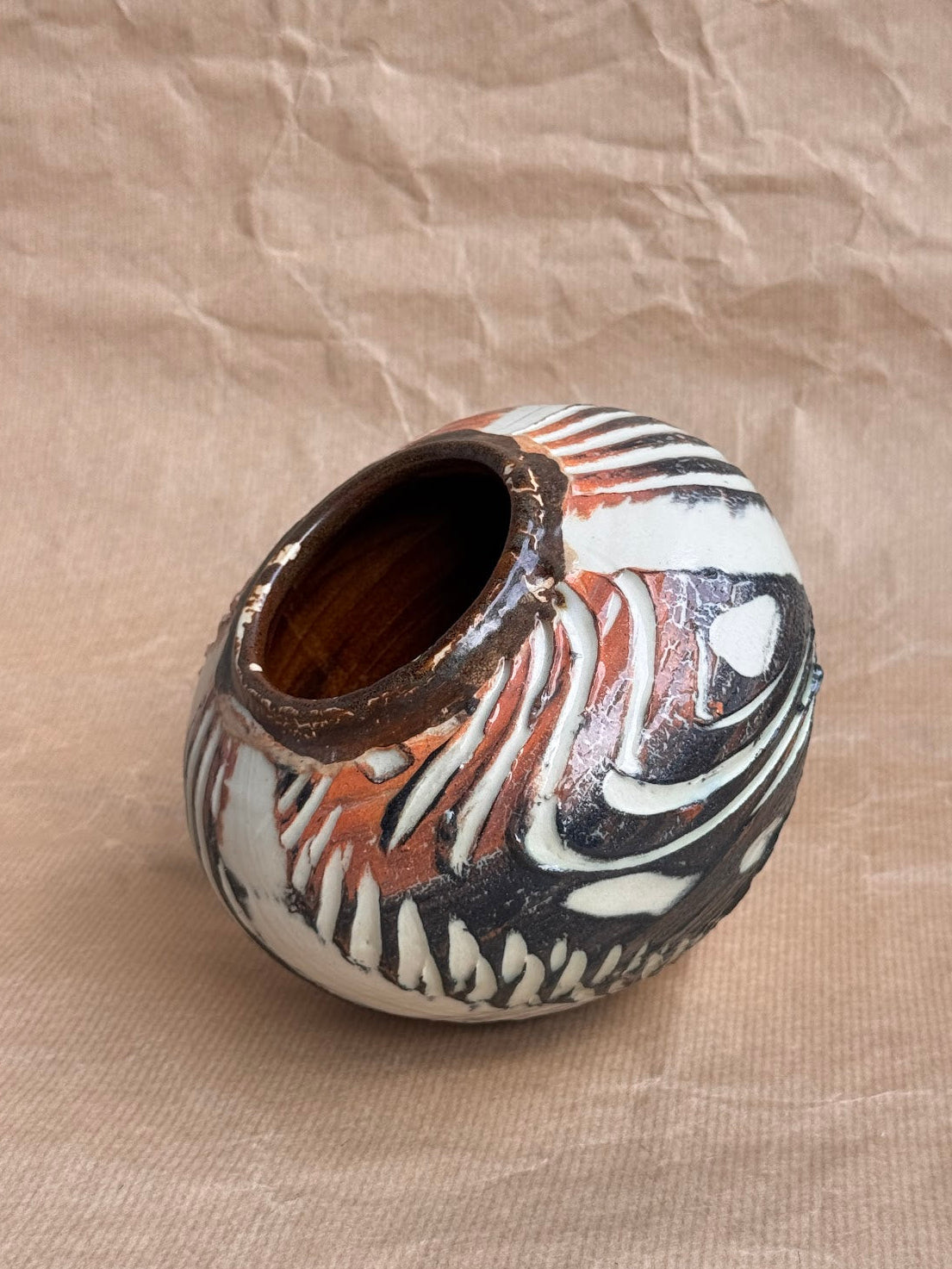 Slip surface detail on stoneware vase