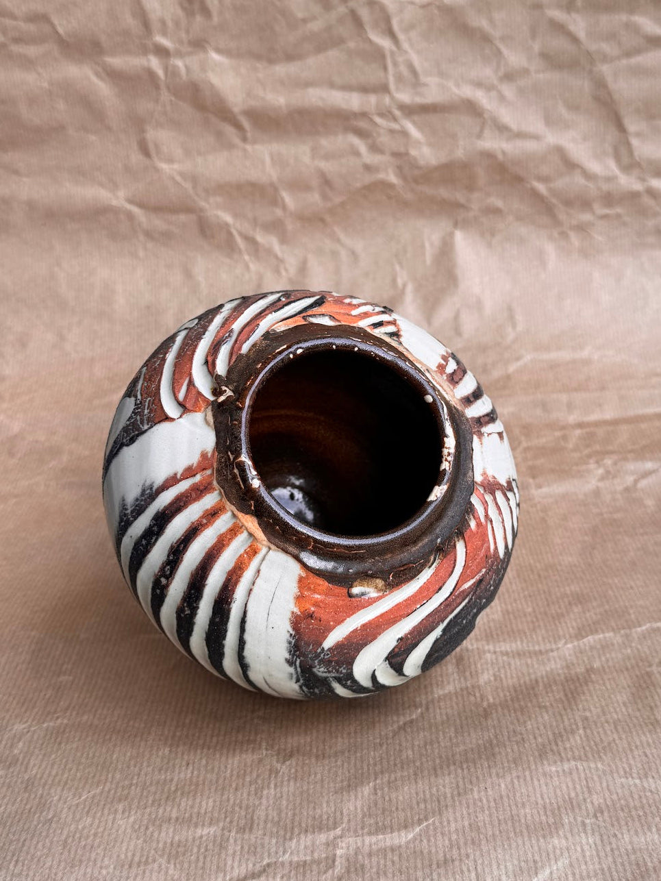 Stretched and scored stoneware vase