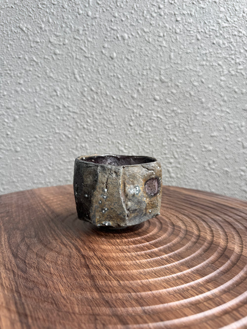 Detail of flame markings on a kurinuki tea bowl, woodfired in Bali