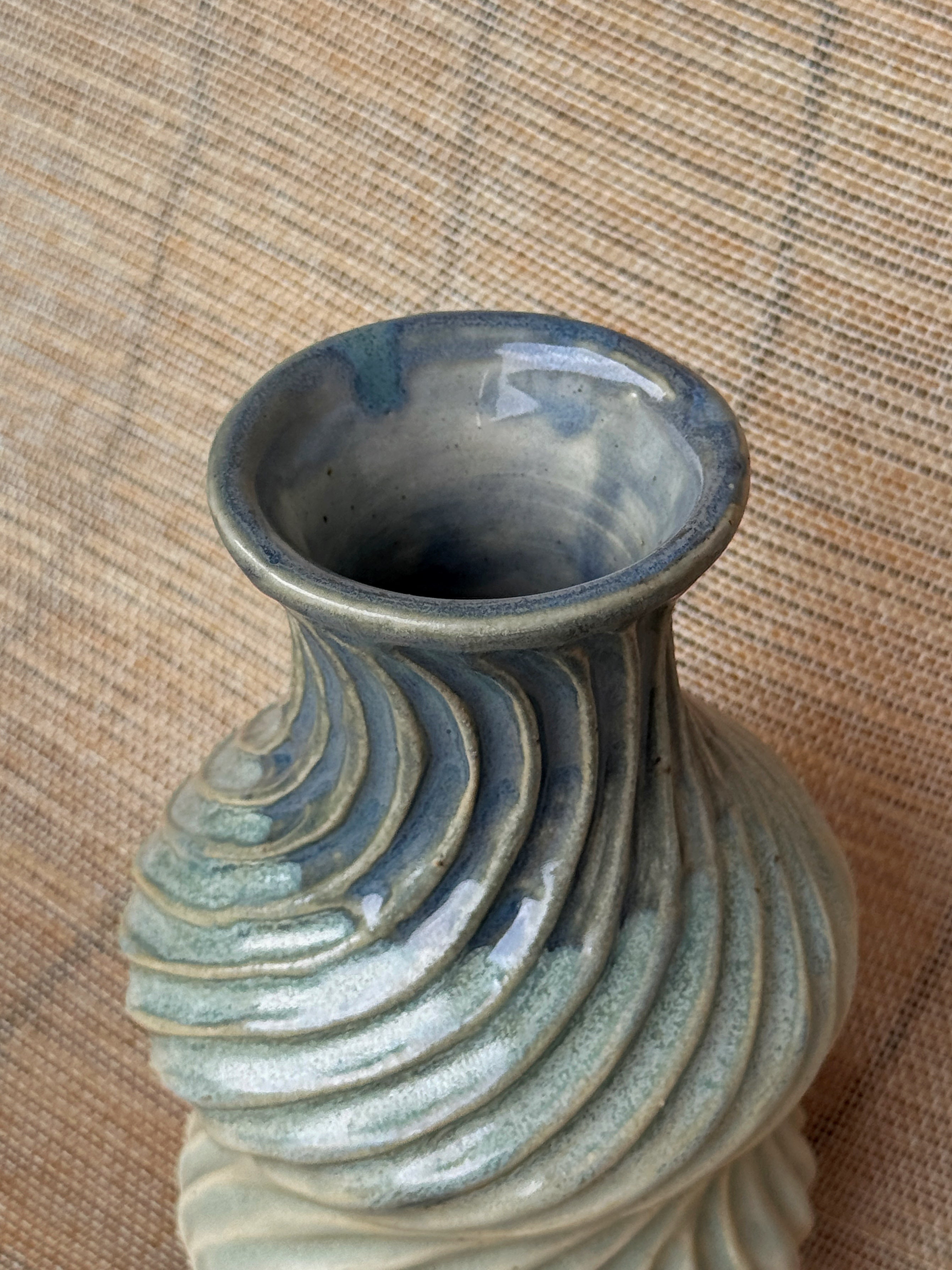 Detail of spiral carving on a small Ripples stoneware vase