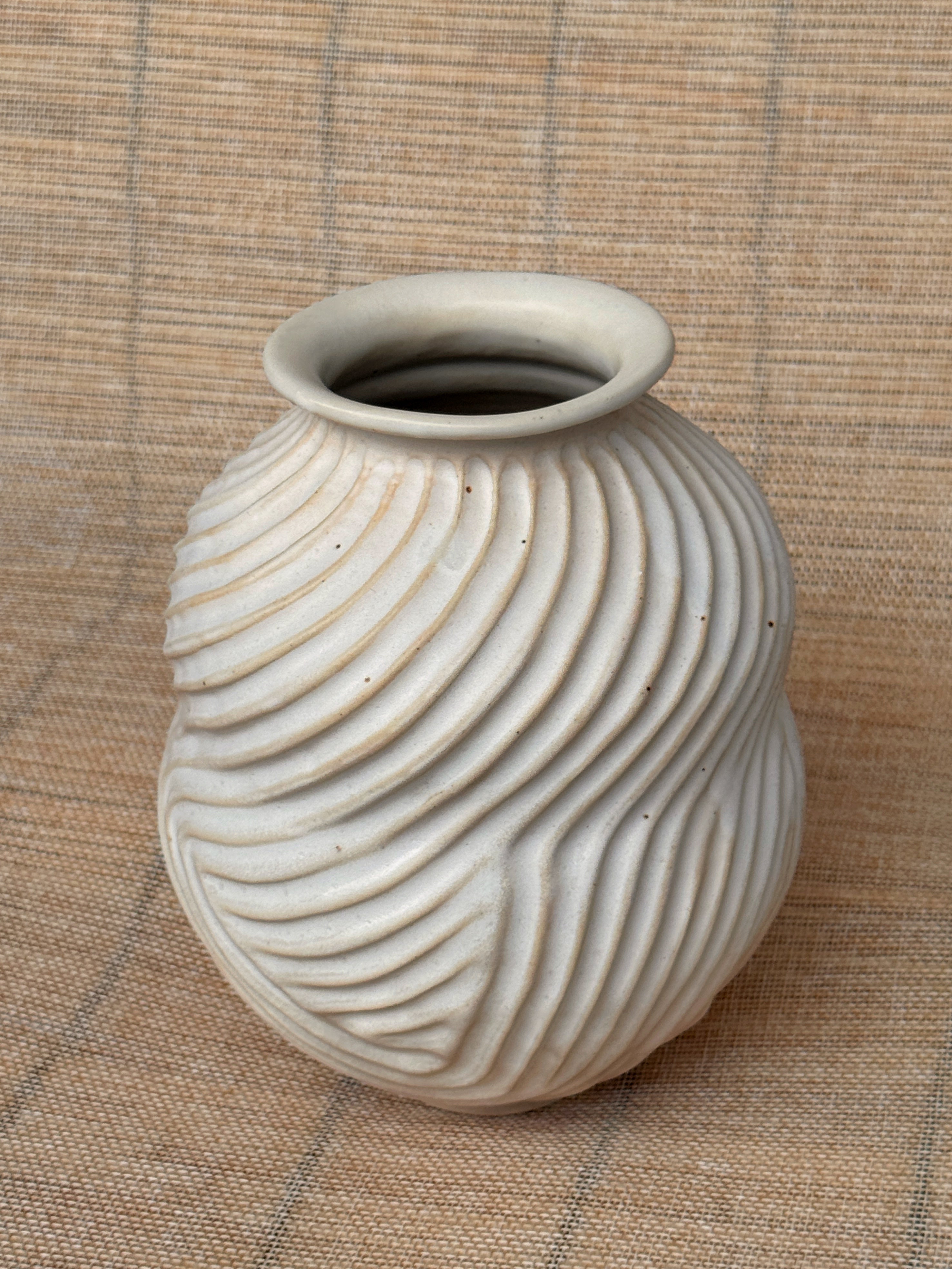 Detail of diagonal carved texture on a Honeycomb stoneware vase