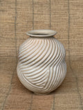 Rounded stoneware vase carved in diagonal waves with matte cream glaze, Honeycomb collection