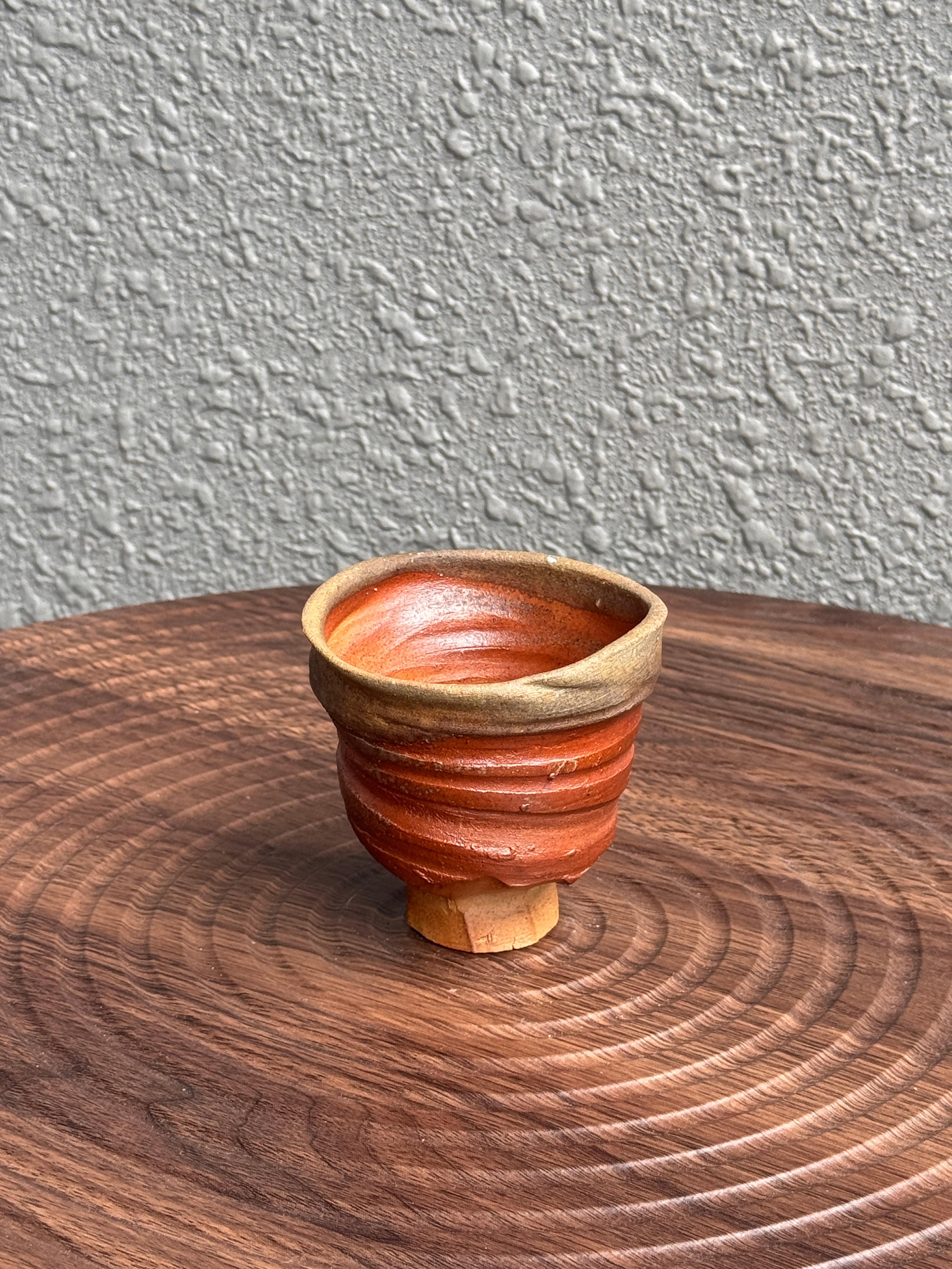 Detail of ash cap and throwing rings on a woodfired yunomi cup, Bali