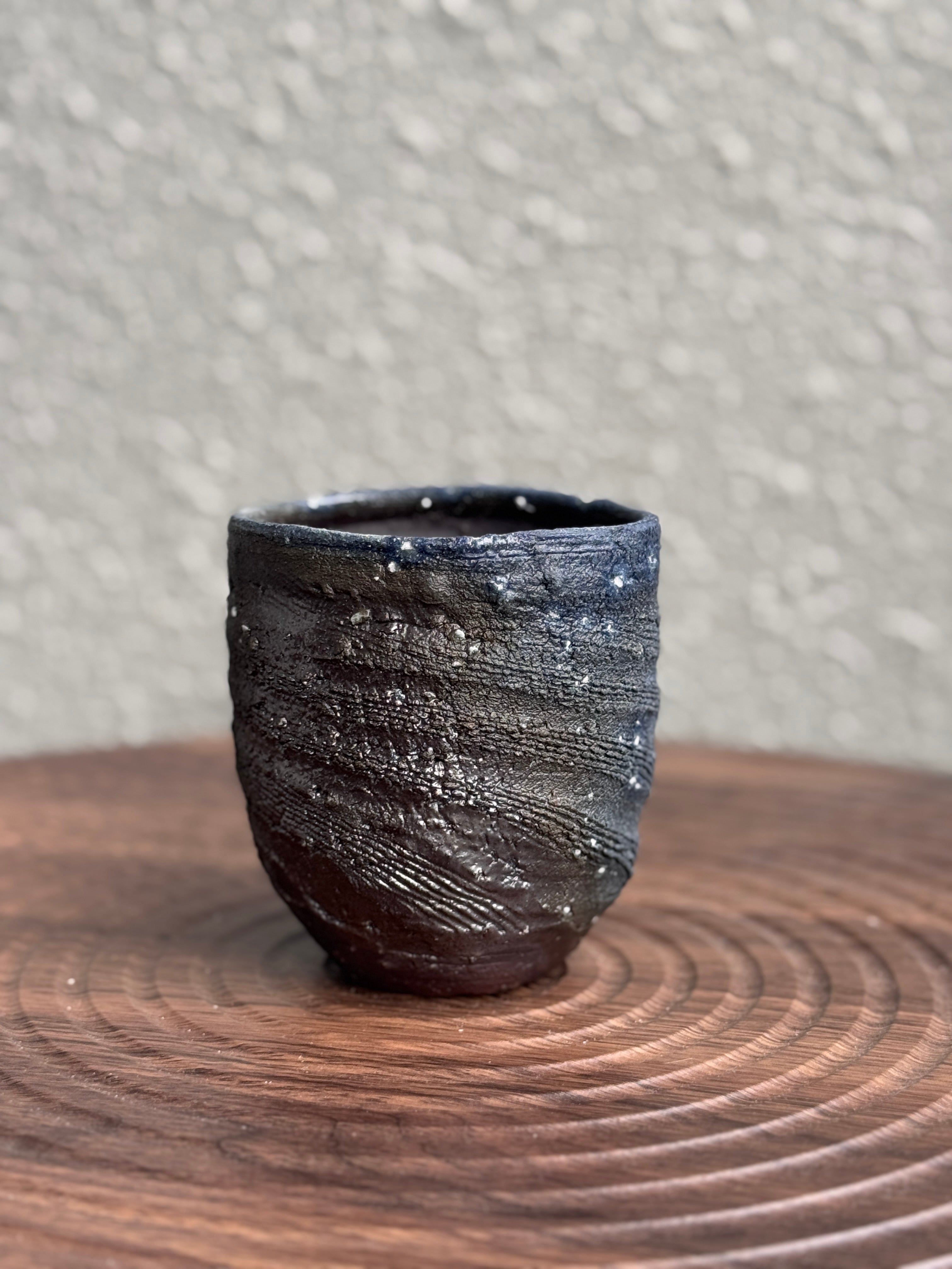 Detail of scored ridges on a woodfired yunomi cup, Ubud Forest