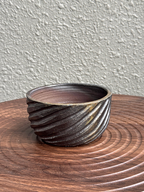 Small ribbed woodfired yunomi bowl with golden amber glaze, Ubud Forest