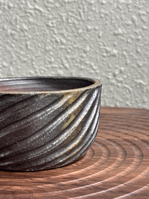 Detail of ribbed texture on a woodfired yunomi bowl, Ubud Forest