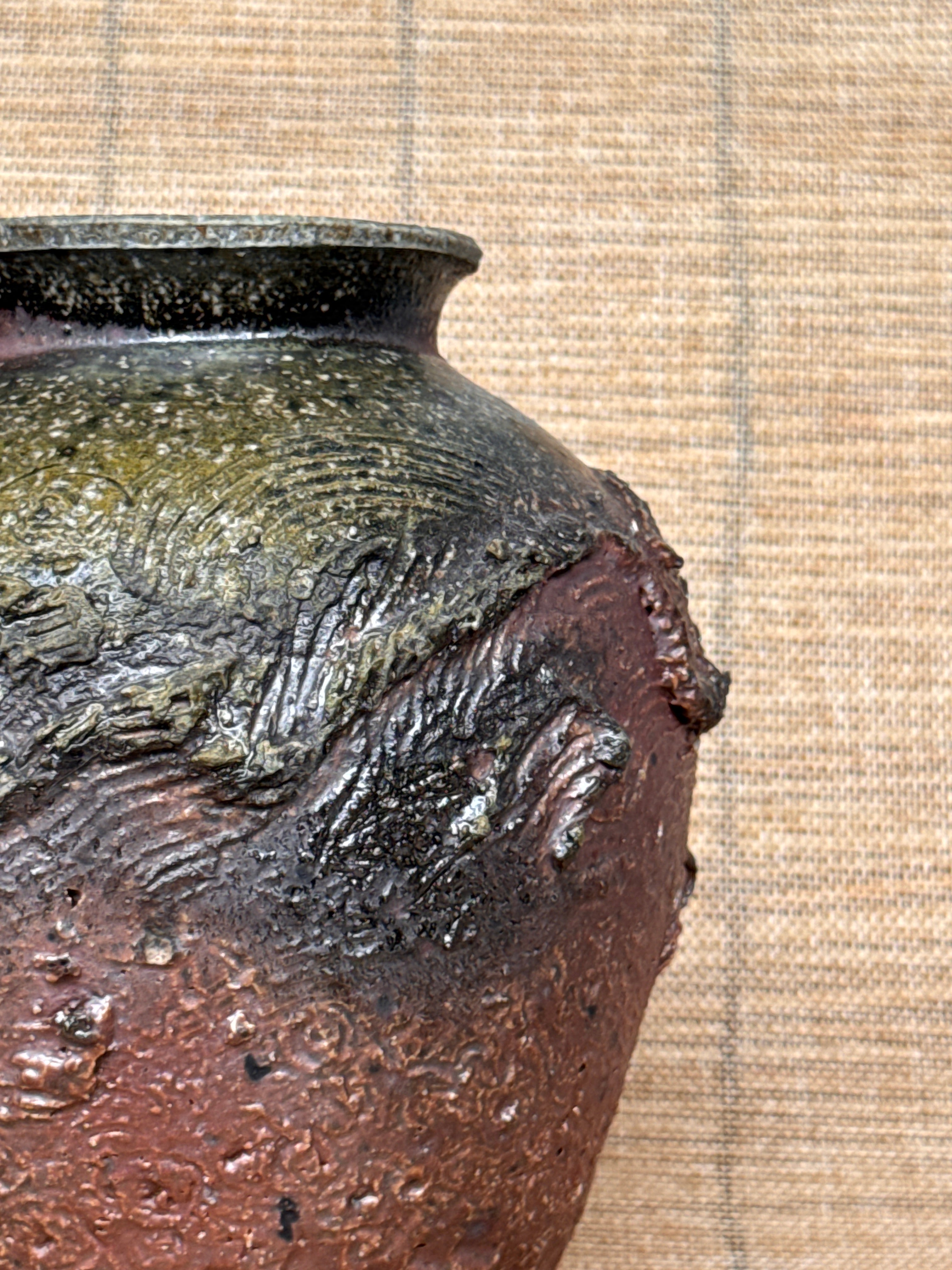 Detail of textured surface on a woodfired stoneware dragon pot, Tokoname