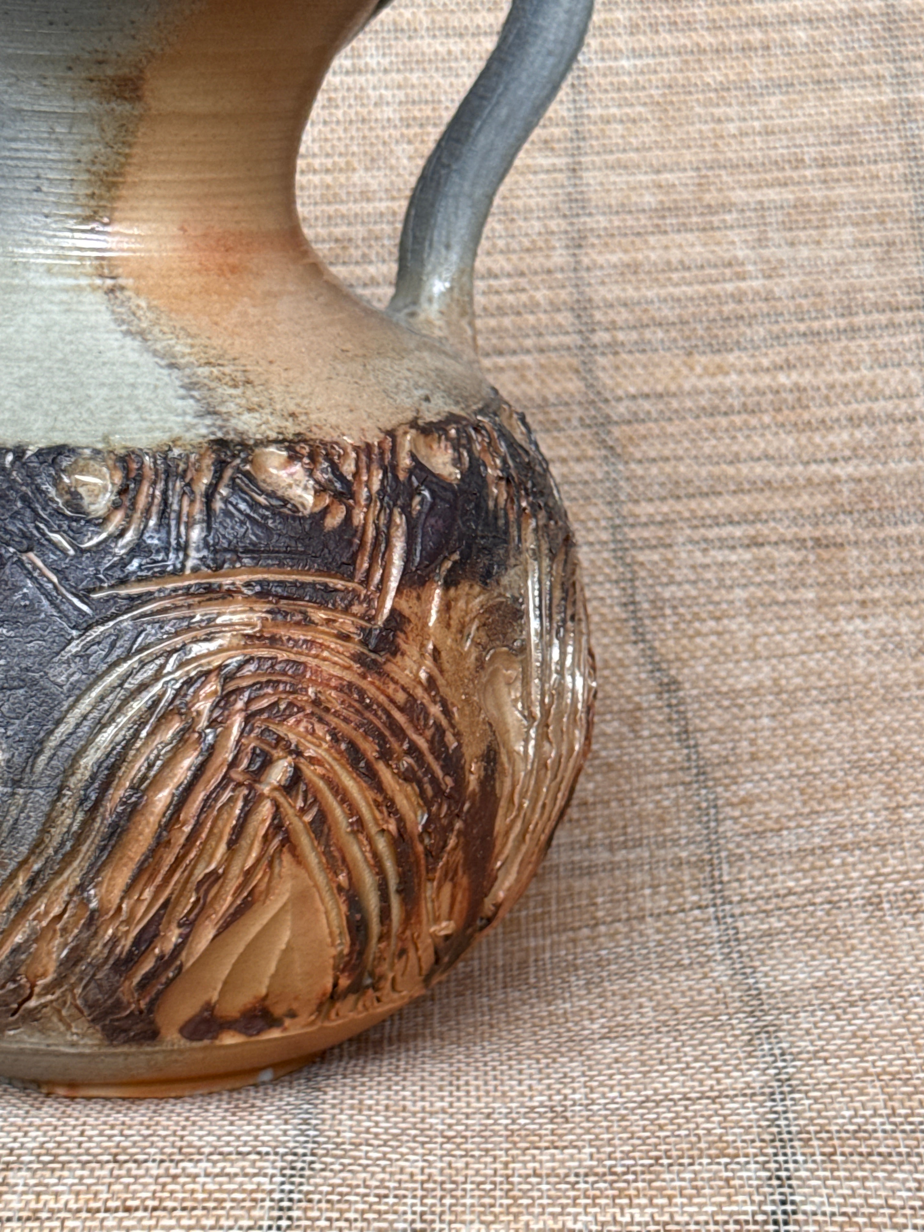 Detail of ash and flame coloring on a woodfired amphora vase, Tokoname