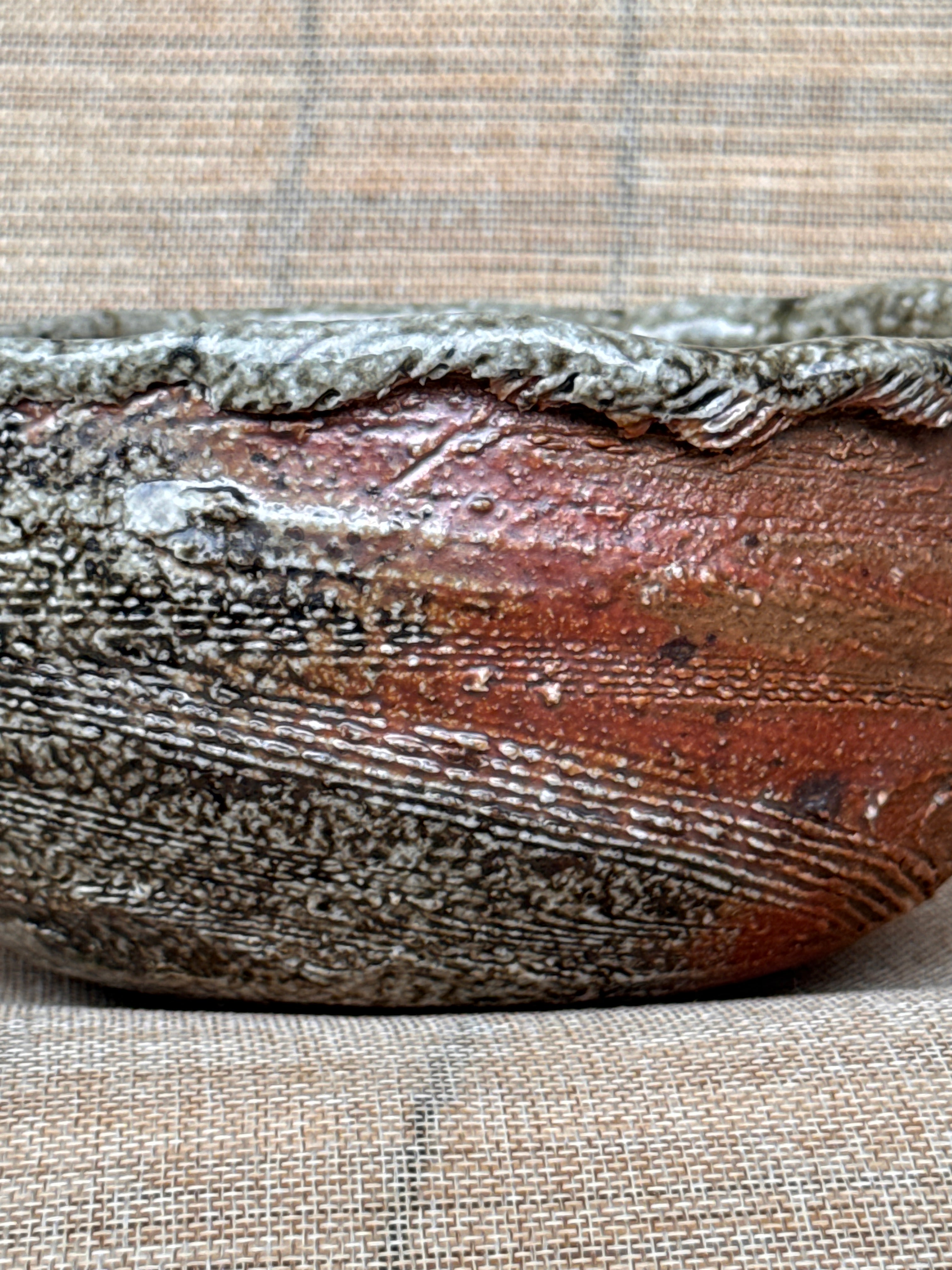 Woodfired stoneware fruit bowl viewed from the side, Tokoname