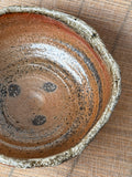 Detail of spiral texture and blue ash crystals on a woodfired fruit bowl, Tokoname