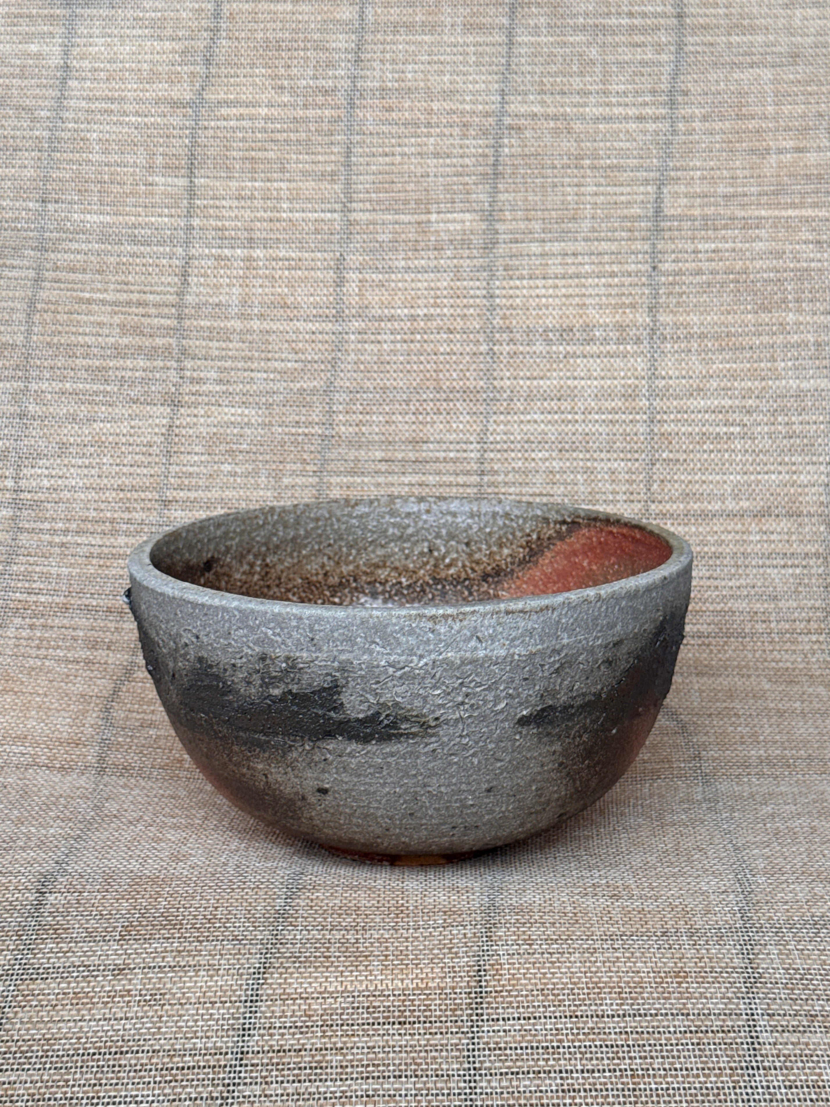 Woodfired stoneware bowl viewed from the side, Tokoname