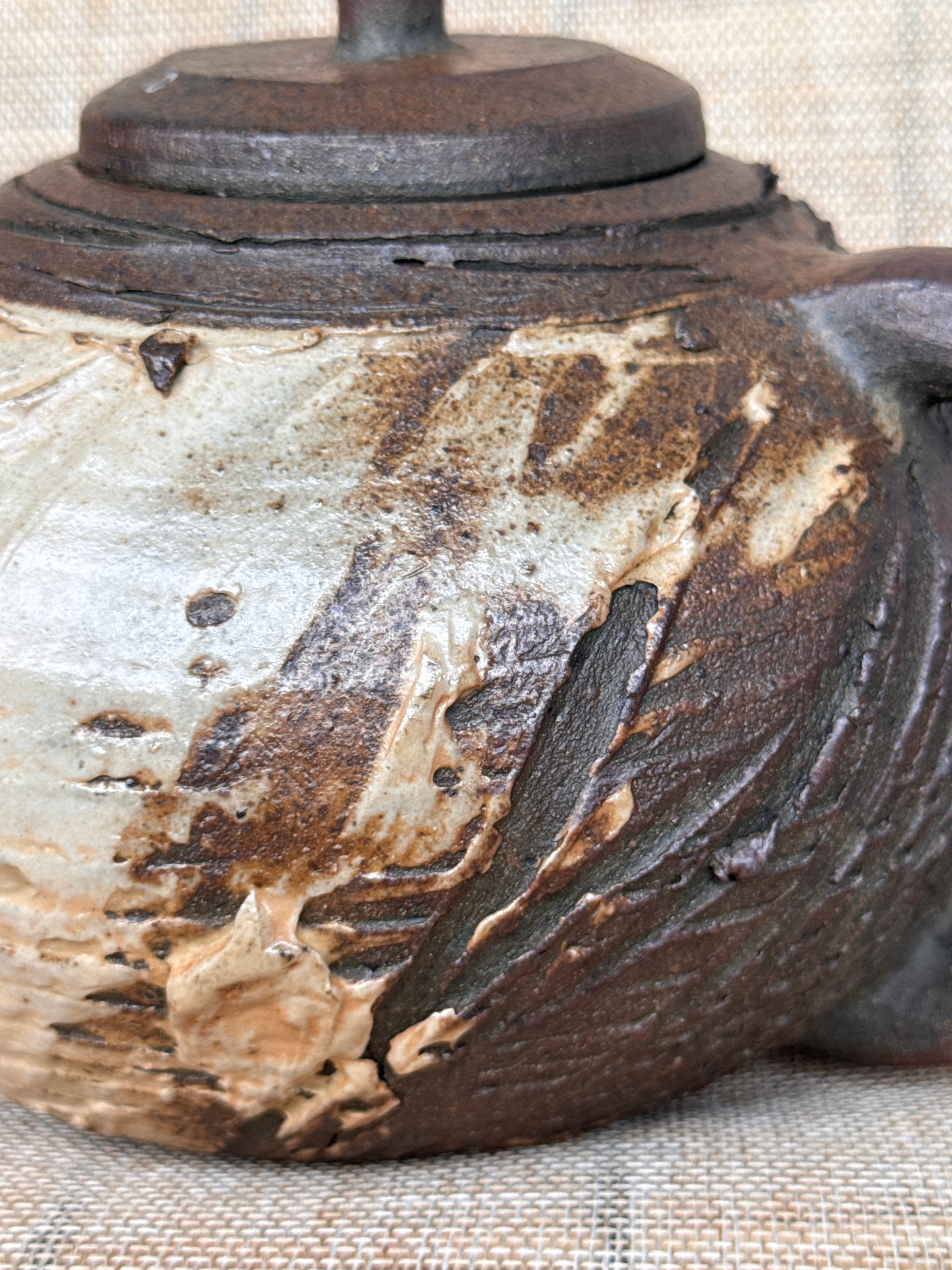Detail of surface texture on a woodfired stoneware teapot, Tokoname